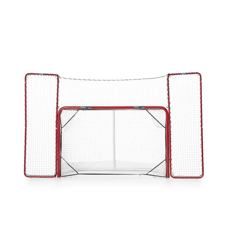Extreme hockeymål backstop med nät som stoppar skott utanför målet, perfekt för hemmaträning.